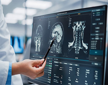 Medical Hospital: Neurologist and Neurosurgeon Talk, Use Computer, Analyse Patient MRI Scan